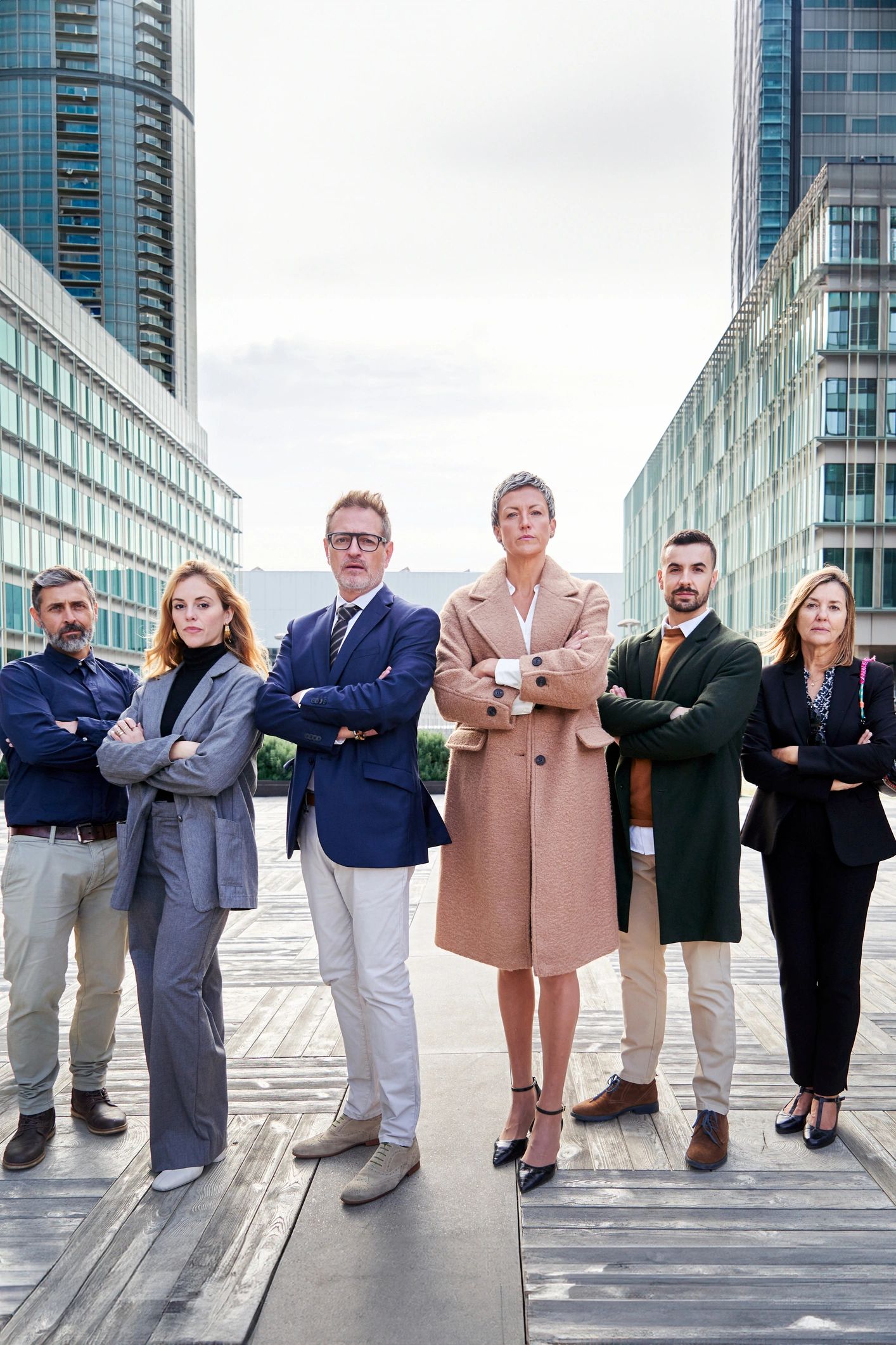 Professional business team standing confidently outdoors