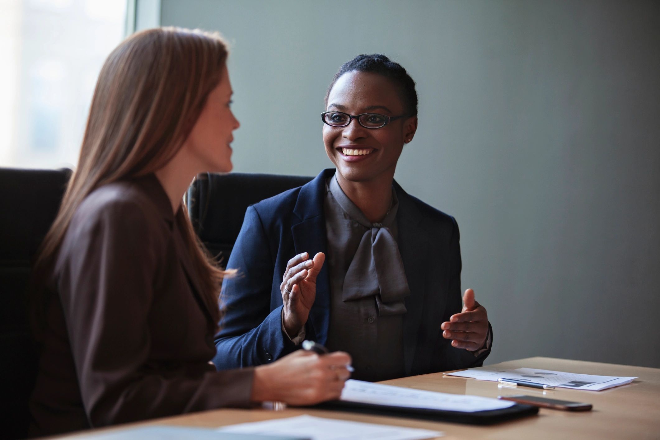 Insurance advisor meeting with a client in an office