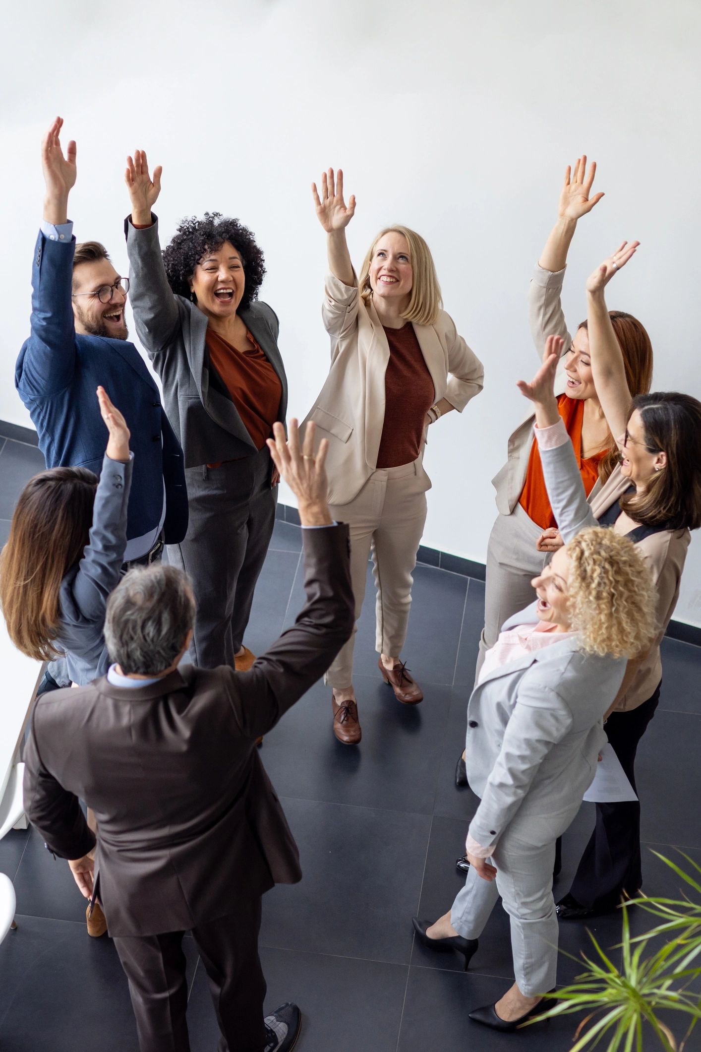 Professional business team celebrating success together